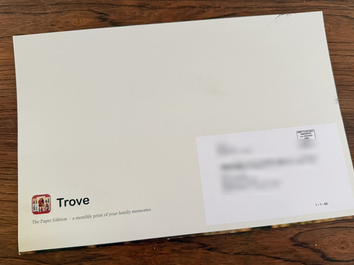 The Paper Edition as it arrives — a self-mailer with a stamped postal indicia, no envelope